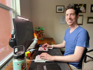 Josh sitting at desk